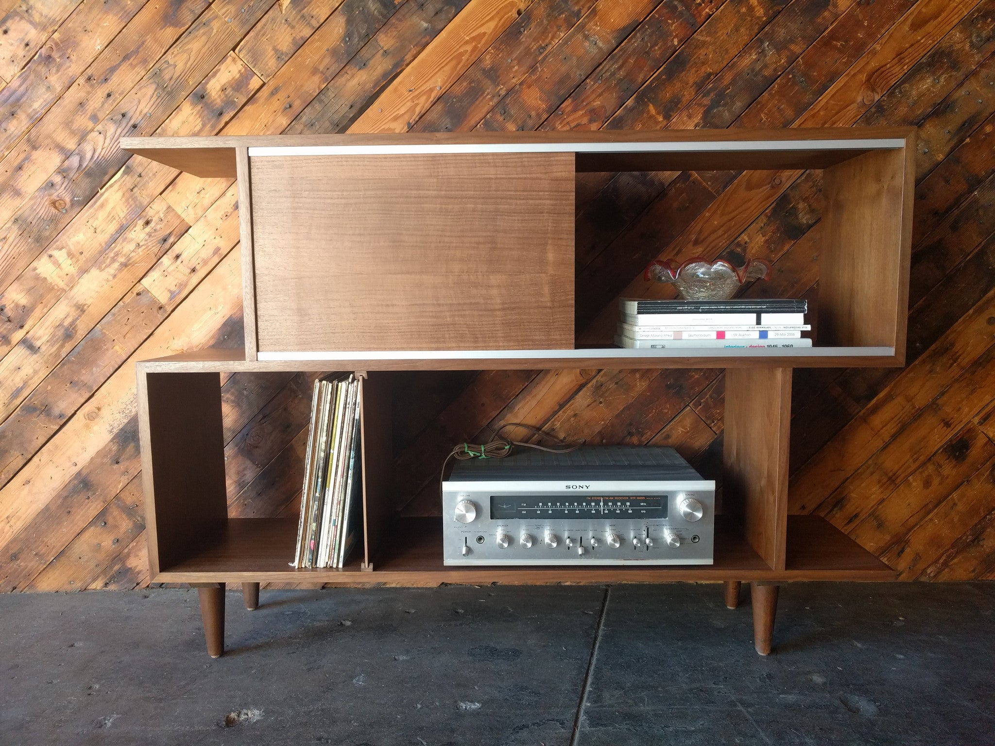 Mid Century Style Custom Walnut Zig Zag Shelf with metal track and sliding door