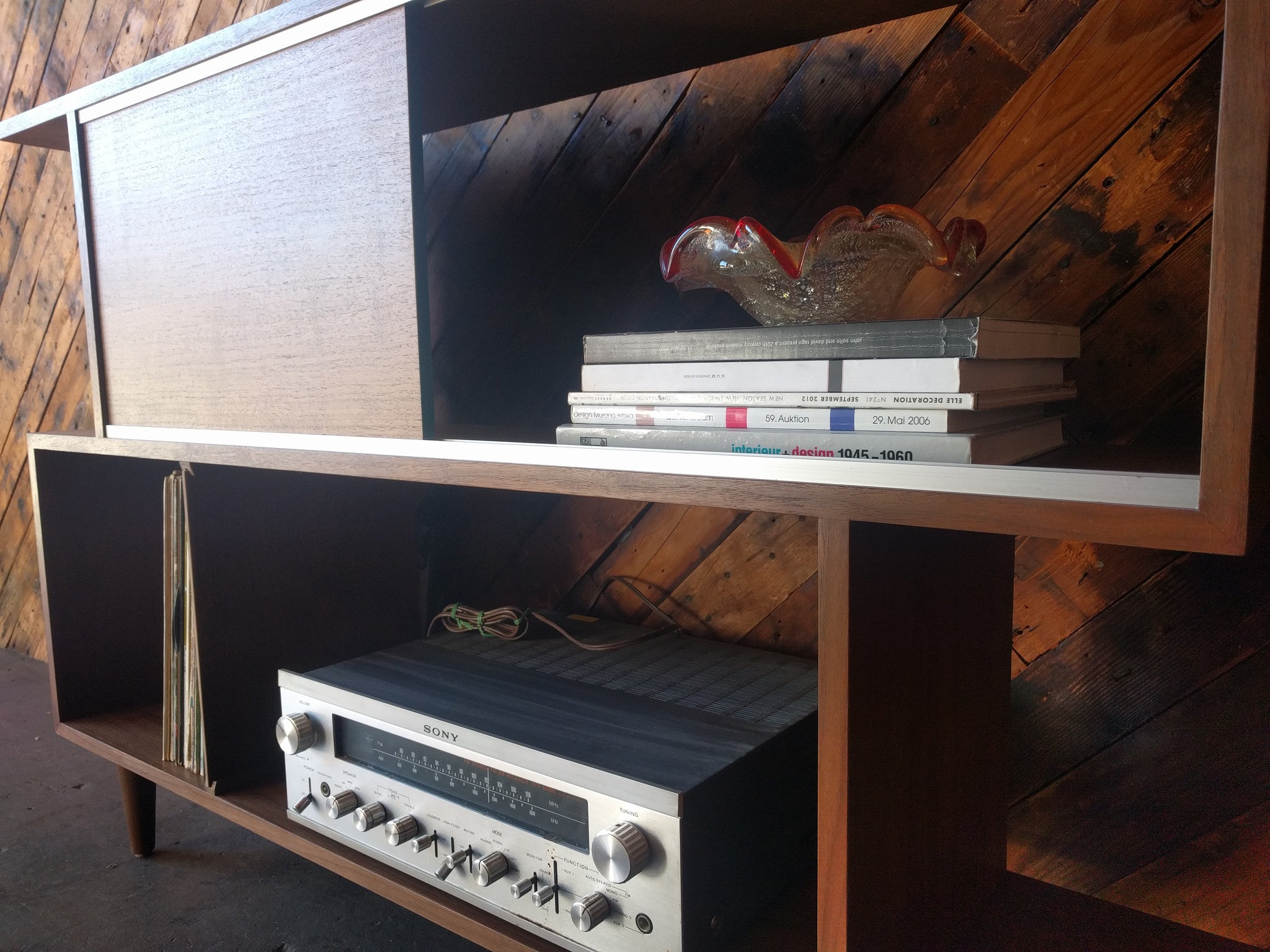 Mid Century Style Custom Walnut Zig Zag Shelf with metal track and sliding door