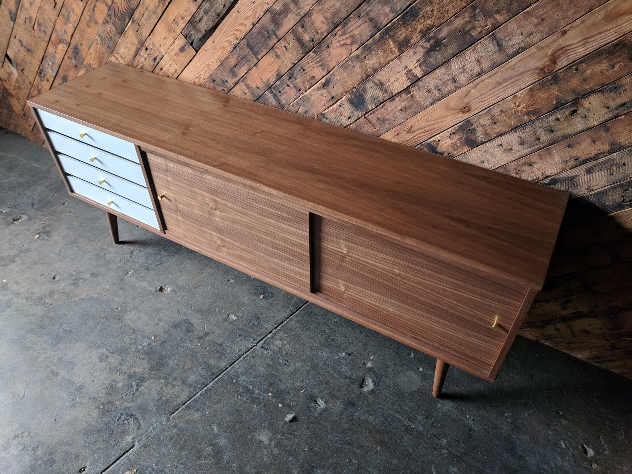 Mid Century Style Custom Credenza with 4 painted drawers, brass knobs and sliding doors