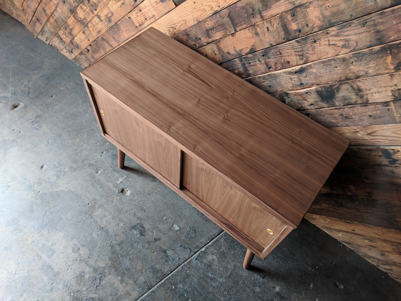 Custom Mid Century Style Walnut Cabinet with painted interior and sliding doors