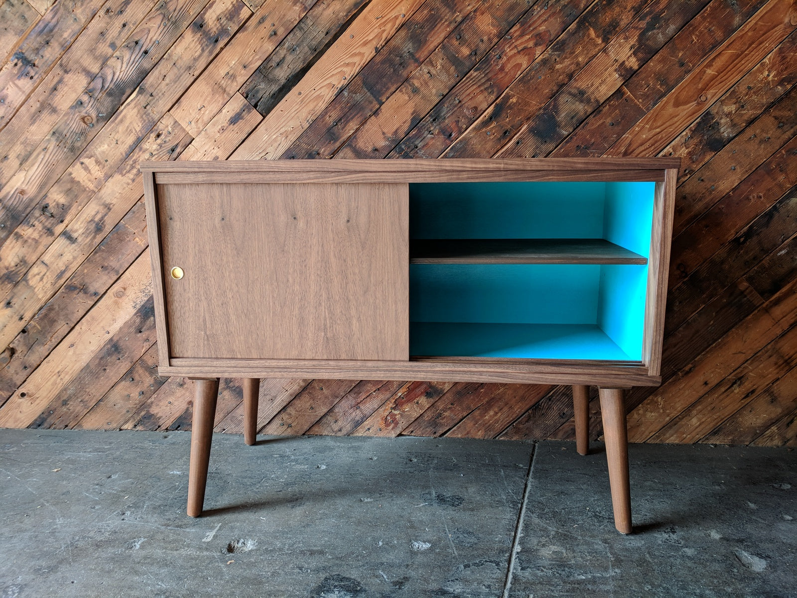 Custom Mid Century Style Walnut Cabinet with painted interior and sliding doors