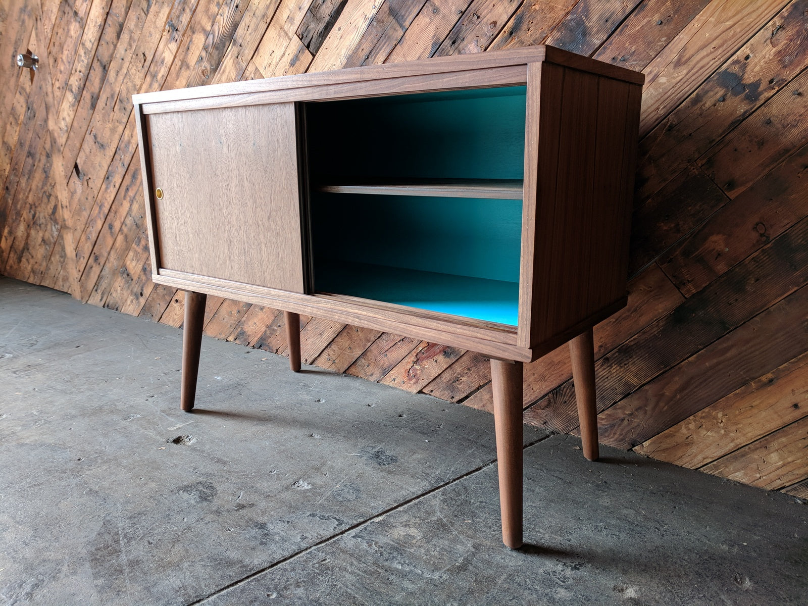 Custom Mid Century Style Walnut Cabinet with painted interior and sliding doors