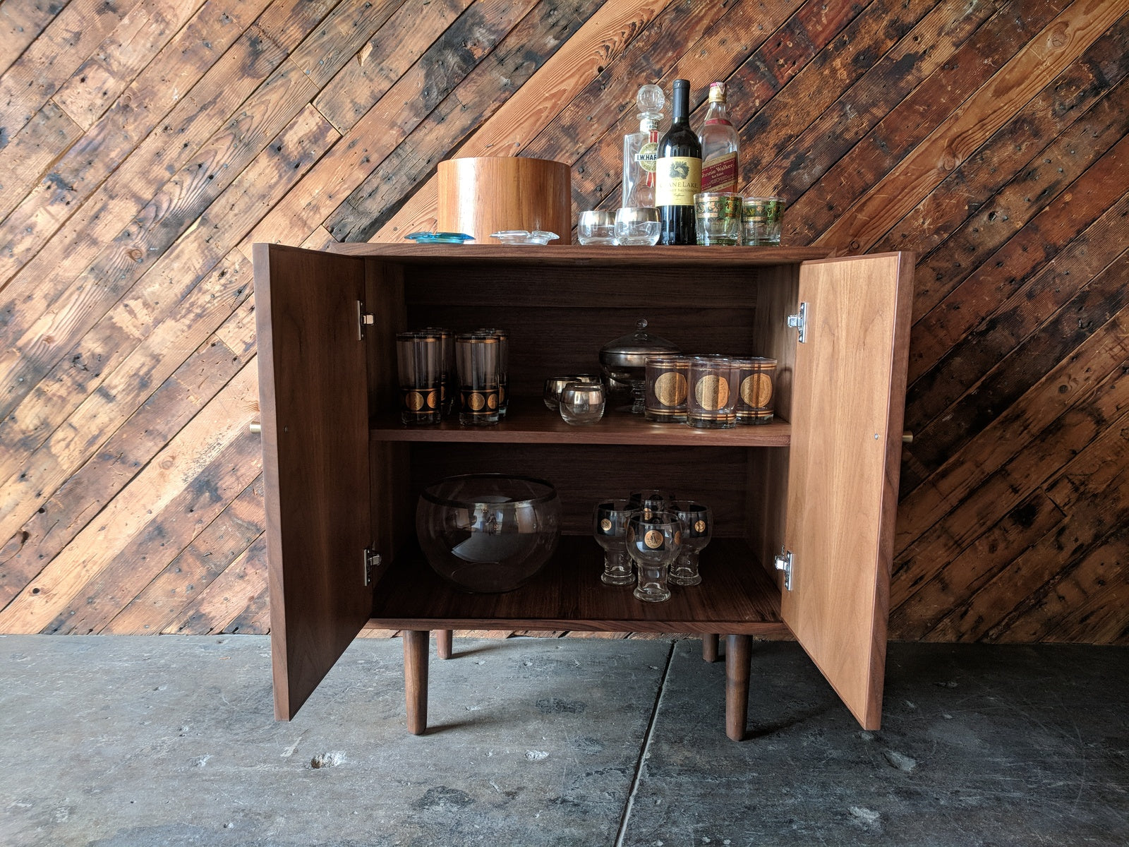 Mid Century Style Walnut Bar/Cabinet with swing out doors and brass knobs