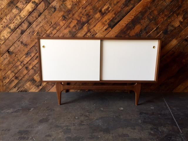 Custom Mid Century Style Walnut Sculpted Base Credenza with painted doors