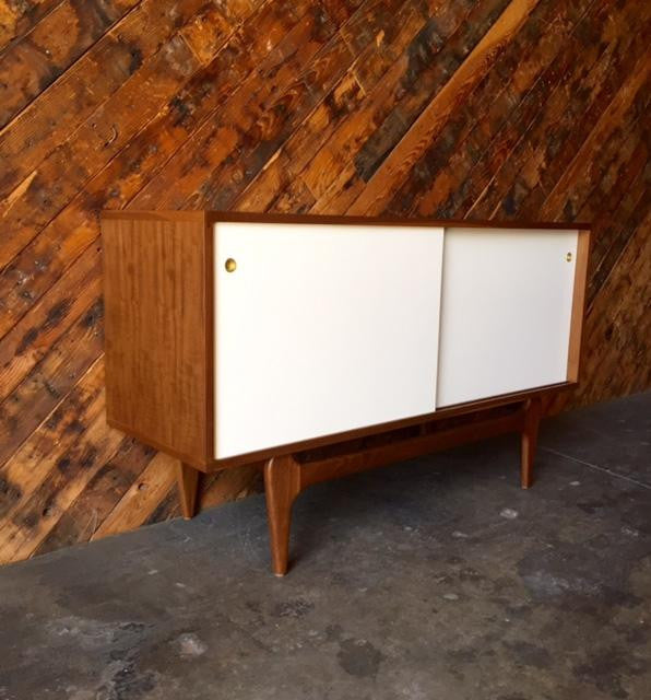 Custom Mid Century Style Walnut Sculpted Base Credenza with painted doors