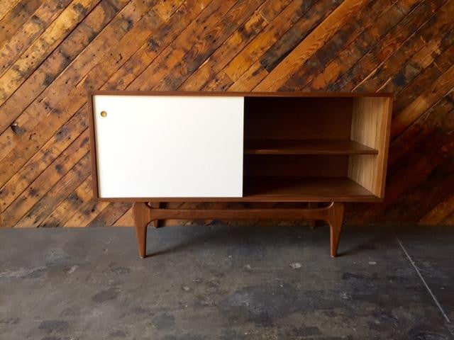Custom Mid Century Style Walnut Sculpted Base Credenza with painted doors