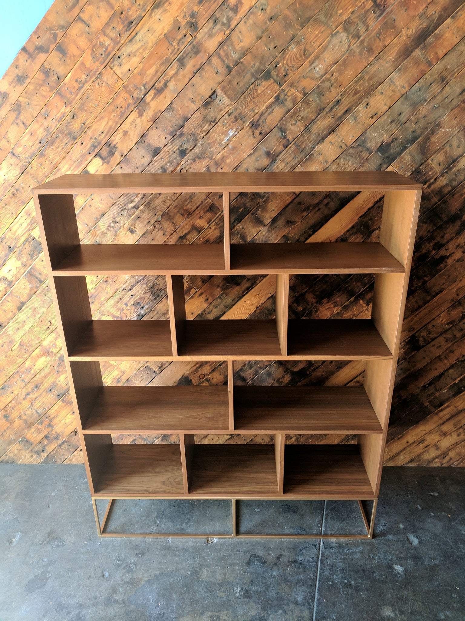 Custom Walnut Book/Record shelf with Brass Colored Metal Base, Mid Century Style with 10 bays