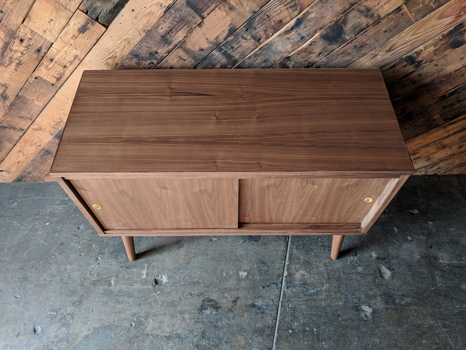 Custom Mid Century Style Walnut Cabinet with painted interior and sliding doors