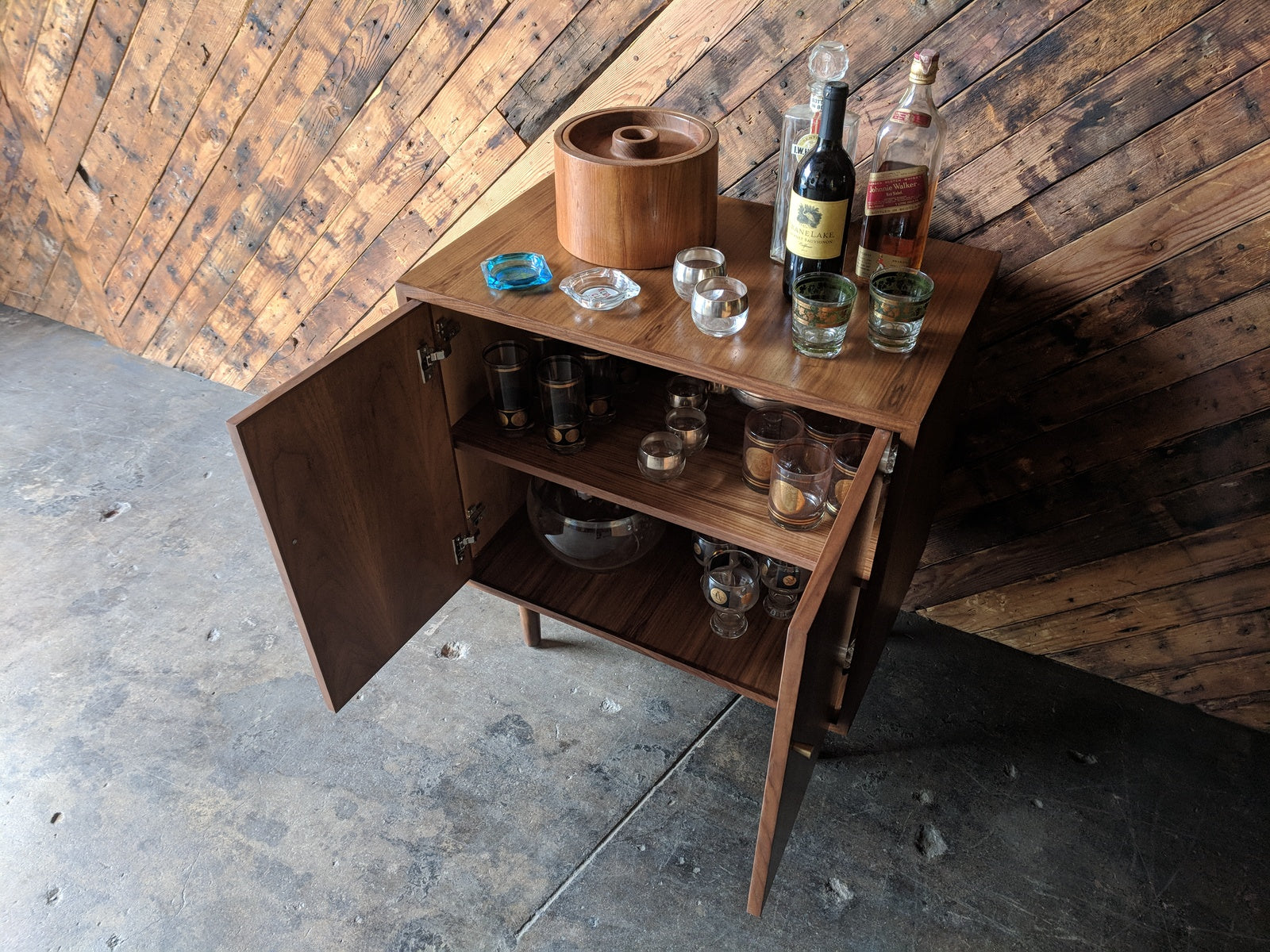 Mid Century Style Walnut Bar/Cabinet with swing out doors and brass knobs