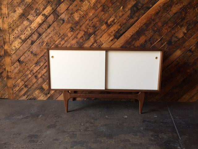 Custom Mid Century Style Walnut Sculpted Base Credenza with painted doors